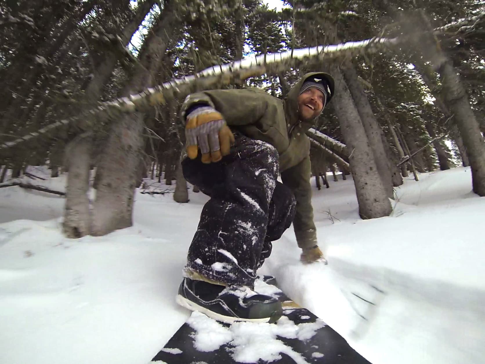 Brandon Saunders getting low on his grassroots powsurfer.